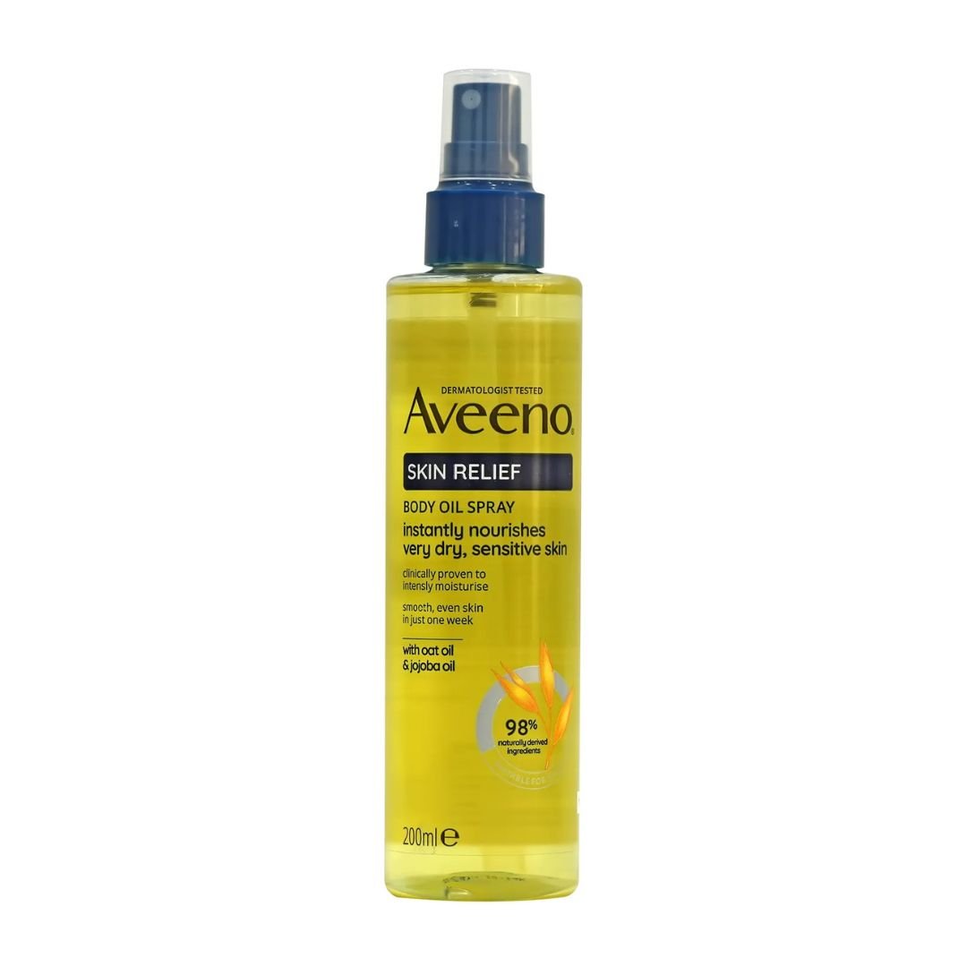 White-background image of Aveeno Skin Relief Body Oil Spray 200 ml with pump, featuring blue label. Highlights oat and jojoba oils formulated for very dry, sensitive skin.