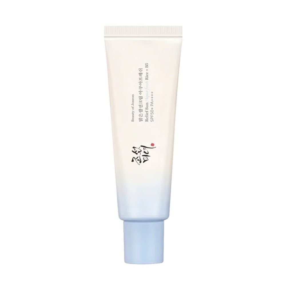 Beauty of Joseon Relief Sun Aqua-Fresh tube (50ml) on white background. Label features “SPF50+ PA++++” in bold, with a translucent lotion sample showcasing its lightweight, non-greasy texture. Ideal for humid climates, the design emphasizes rice seed water and vitamin B5 for Ghanaian skincare routines.